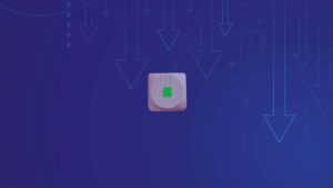 Wooden block with a green full stop in it's centre against a blue background with downward arrows.
